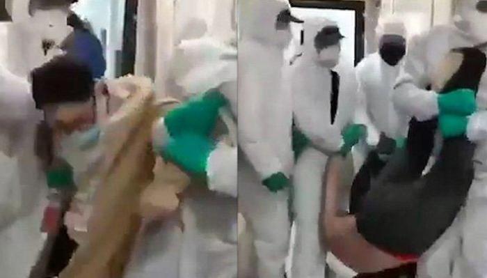 Koronavirusun sürətlə yayıldığı Çindən dəhşətli kadrlar: İnsanları sürüyərək… – VİDEO