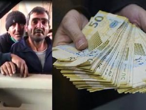 Bakıda naməlum şəxs insanlara pul paylayır — VİDEO
